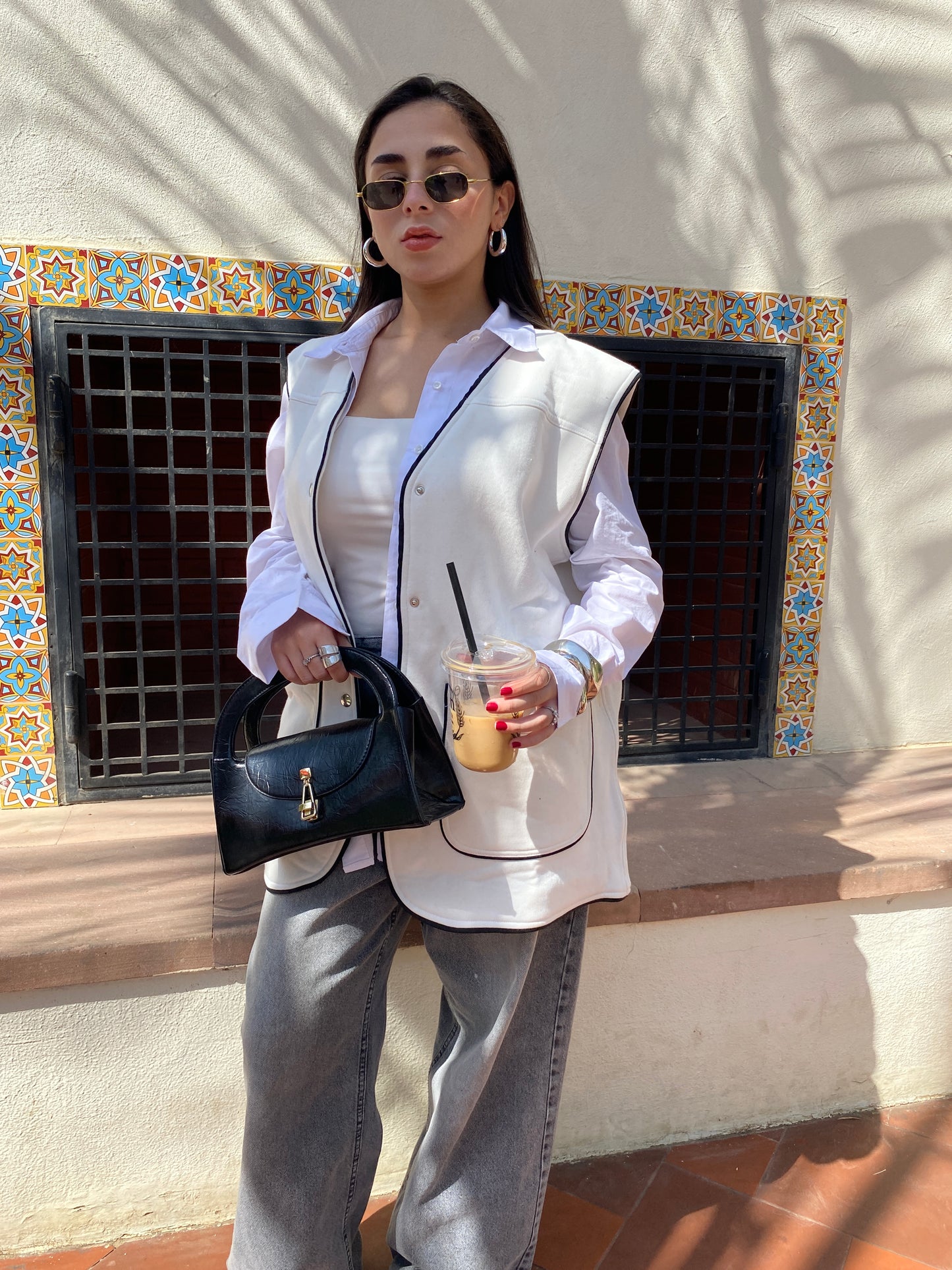 Off White vest with black trim