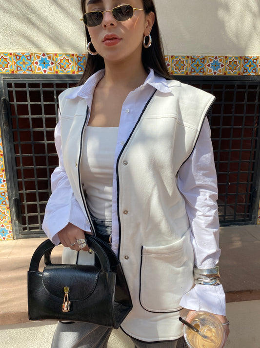 Off White vest with black trim