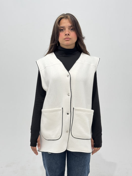 White vest with black trim